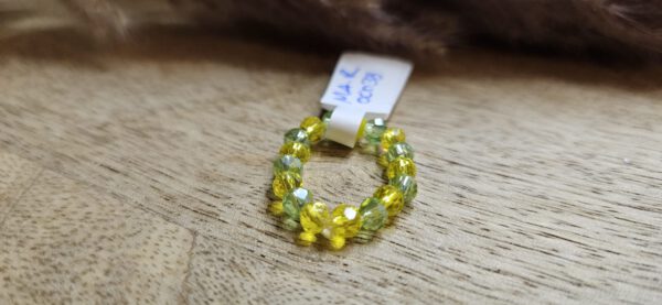 Ring mit Facettierten Perlen grün/Gelb