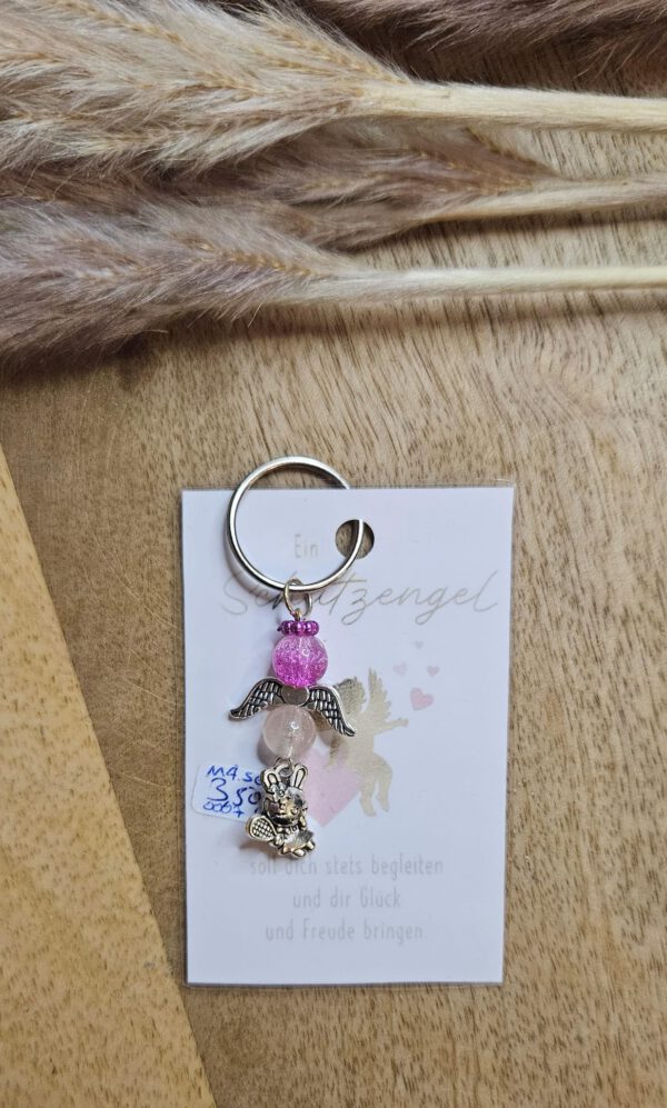 Schutzengel mit einem Anhänger pink