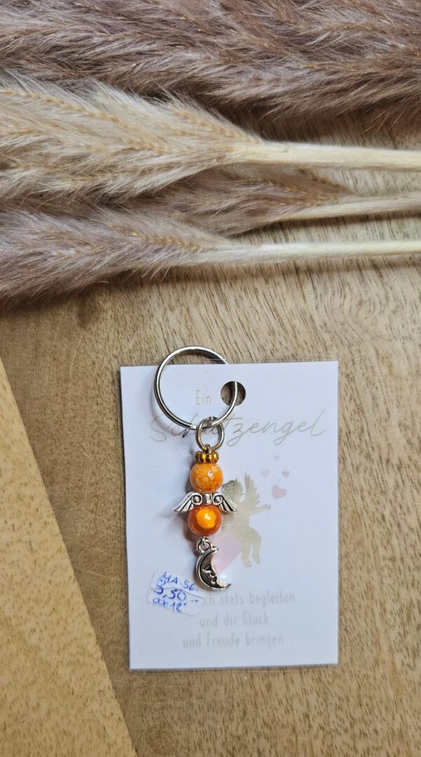 Schutzengel mit einem Mond Anhänger orange