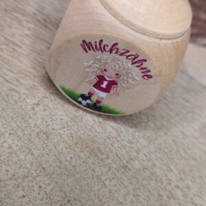 Mädchen mit einem Fußball
